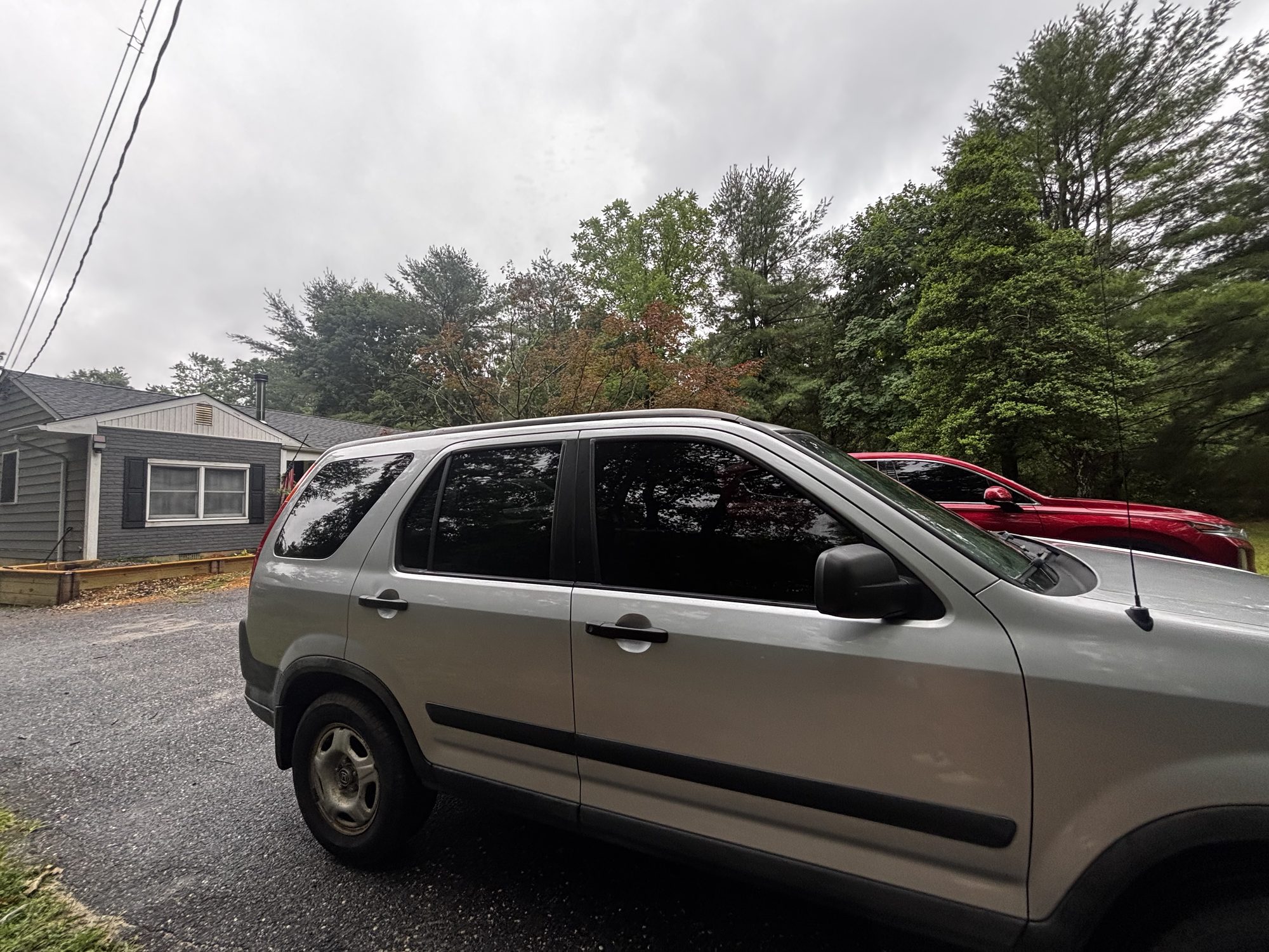 Honda CR-V with full ceramic window tint, side profile