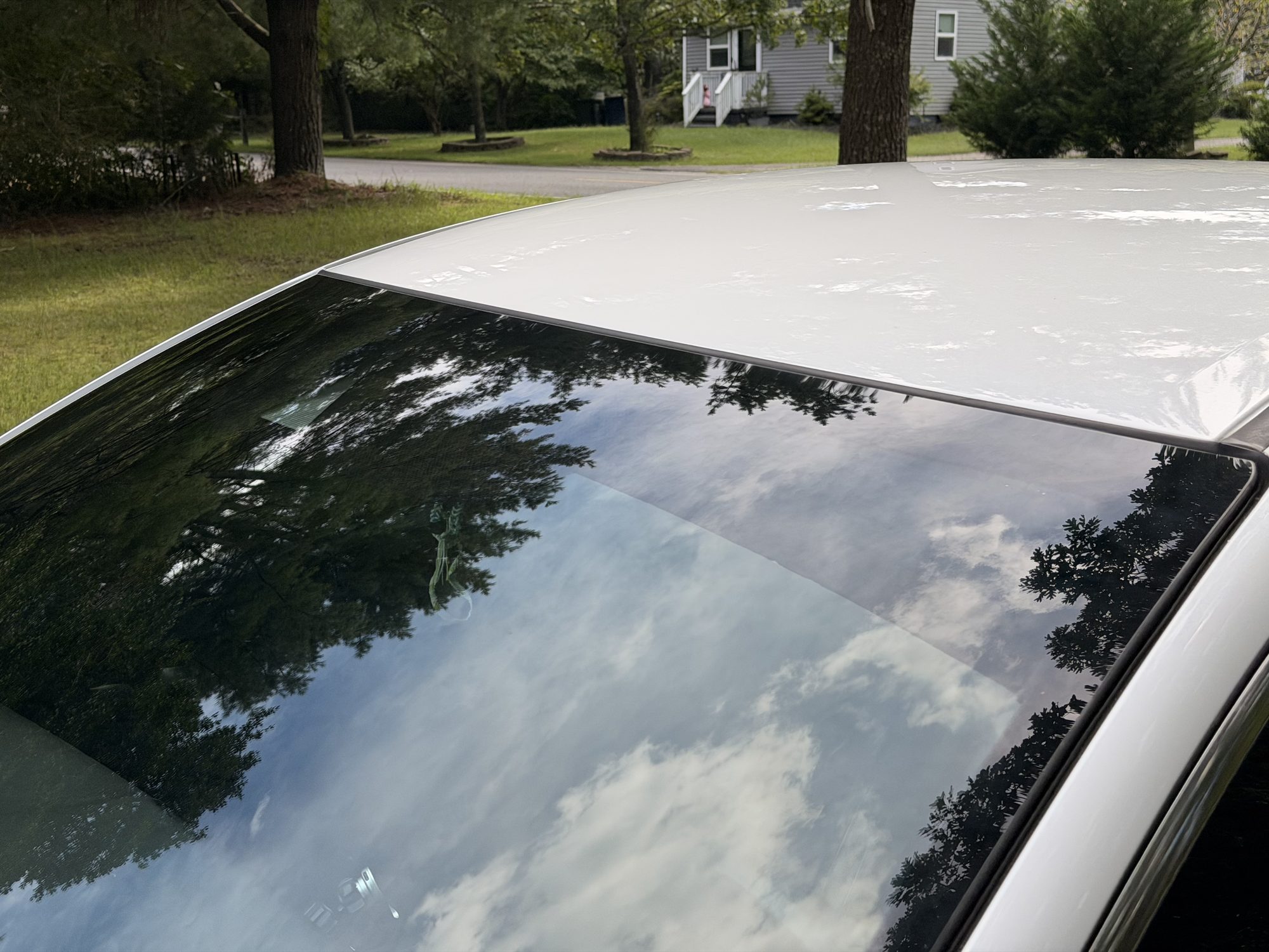 Close-up of ceramic-tinted glass along the roofline