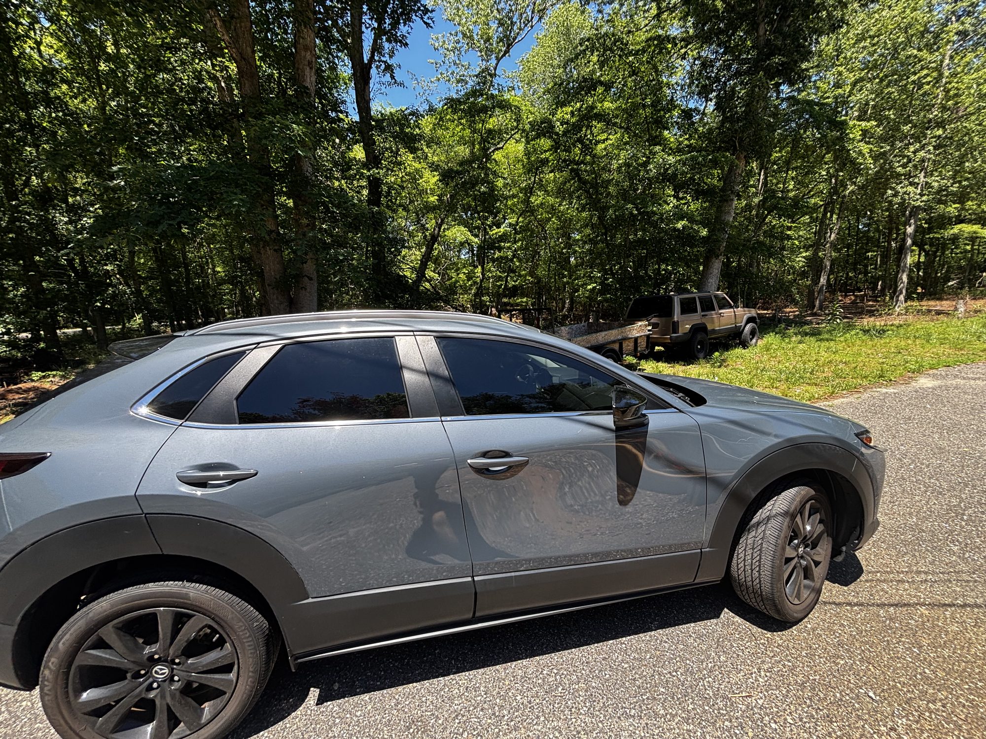 Mazda CX-30 SUV with full ceramic window tint, side profile